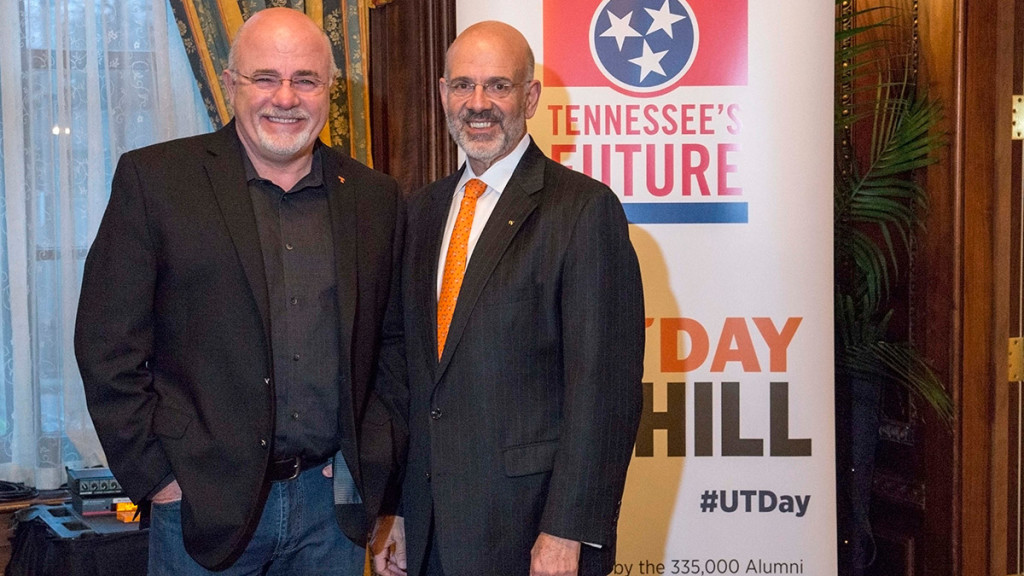 Joe DiPietro and Dave Ramsey in front of #UTDay banner