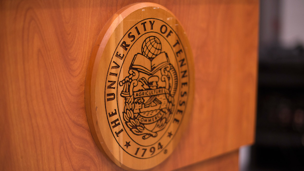 detail of wooden podium with University of Tennessee seal