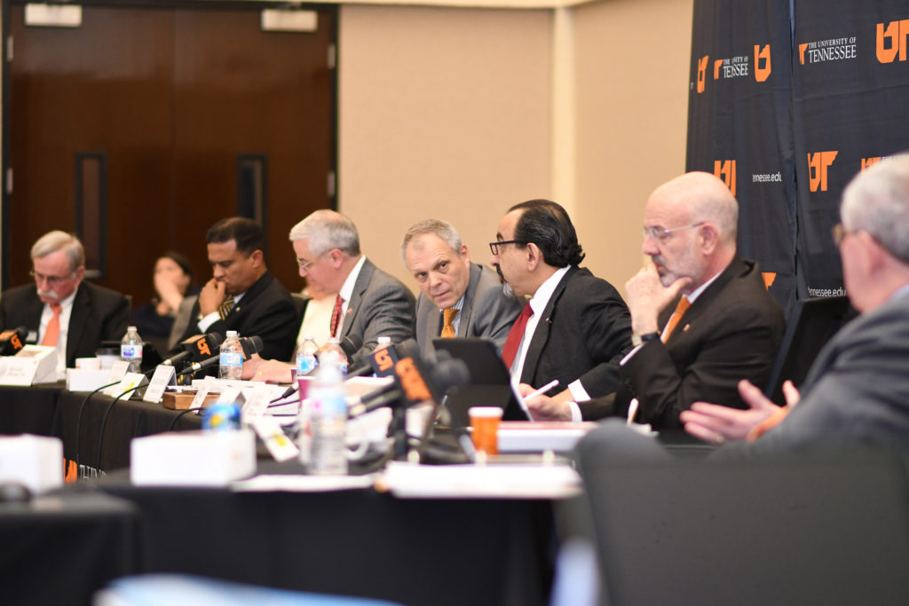 Members of the UT Board engage in a discussion