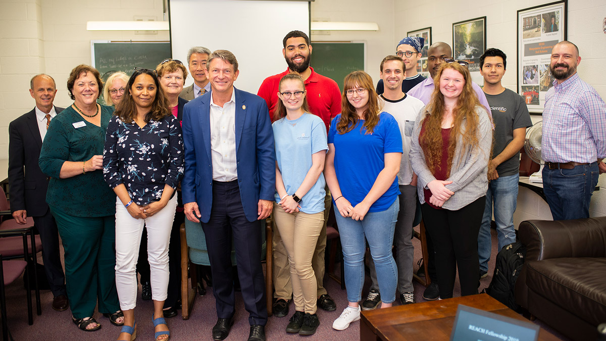 UT interim president Randy Boyd meets with the first class of UT REACH students on the campus of UTIA