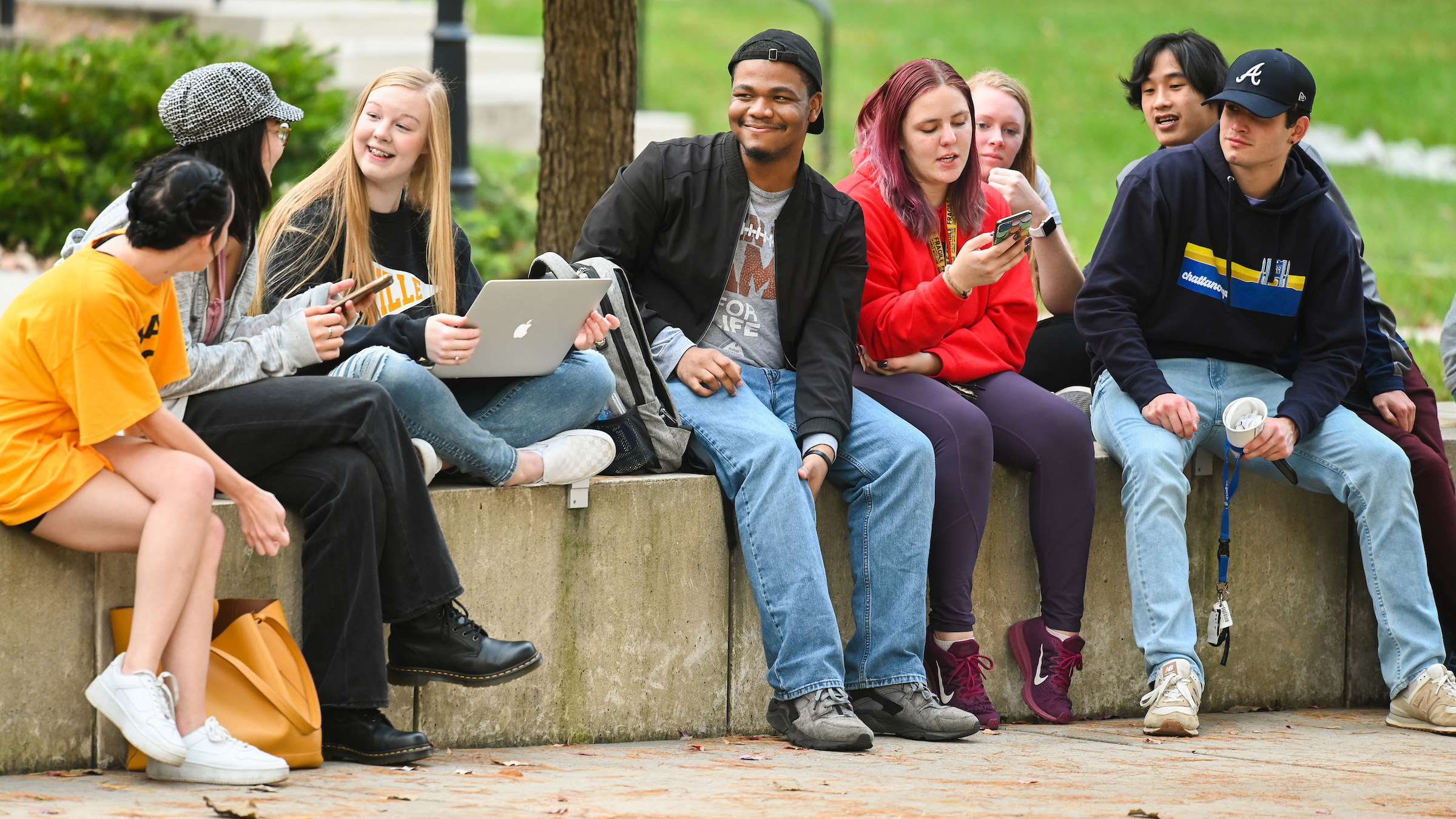 A group of students at UTC share jokes and conversation